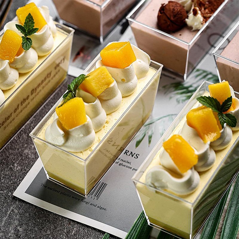 130ml Rectangle Clear Plastic Party Serving Dessert Cups Assorted rectangle dessert cups – 130ml clear containers with different sweets for catering