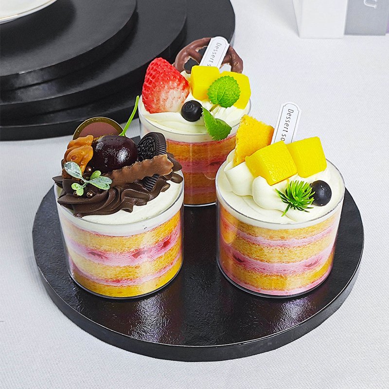 Wholesale Black Round Cake Drums 10 Inch Bulk Cake Boards for Bakeries Wholesale black round cake drums with layered cake for bakery displays and events