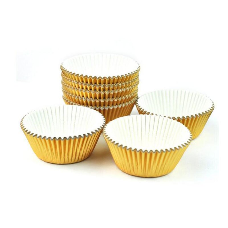 Gold Foil Cupcake Liners, Wholesale for Dessert Shops Gold foil cupcake liners in clean display scene