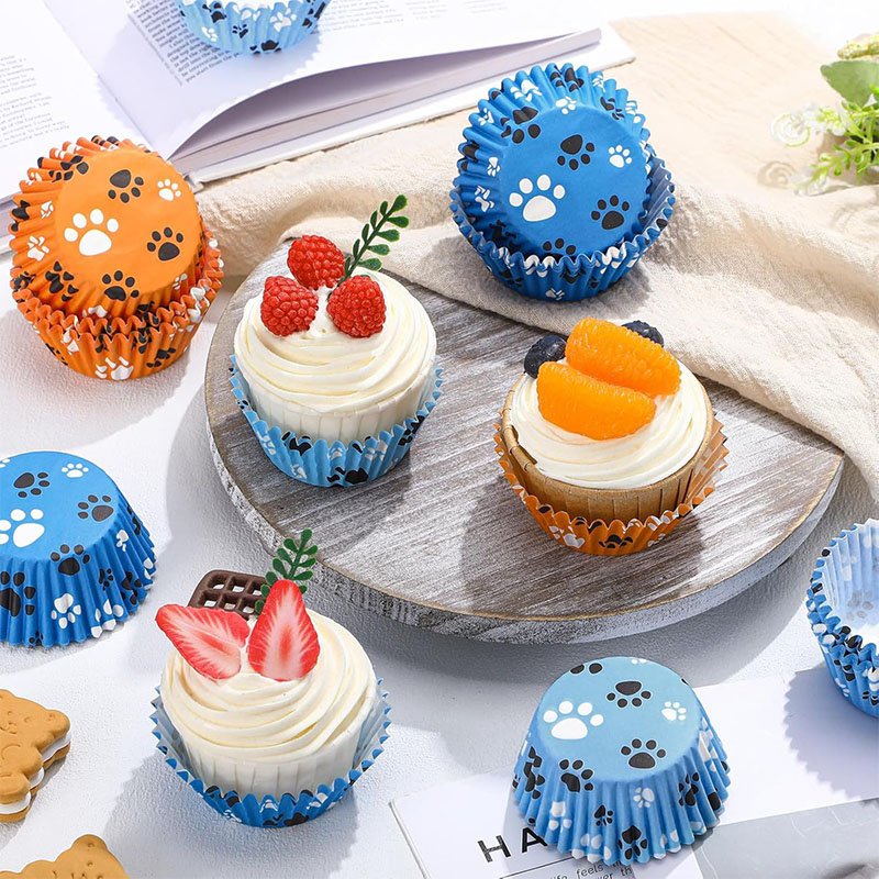Bulk Dog Paw Print Cupcake Liners, Wholesale Party Baking Cups Tray of dog party cupcakes in bulk paw print liners, available in multiple colors